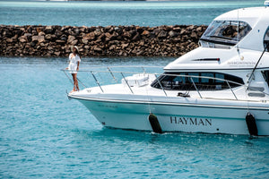 brand photoshoot for intercontinental woman on yacht