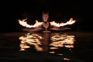 fine art woman portrait playing with fire